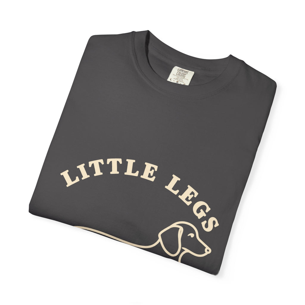 Close-up of the Little Legs lettering and dachshund print on a folded graphite tee